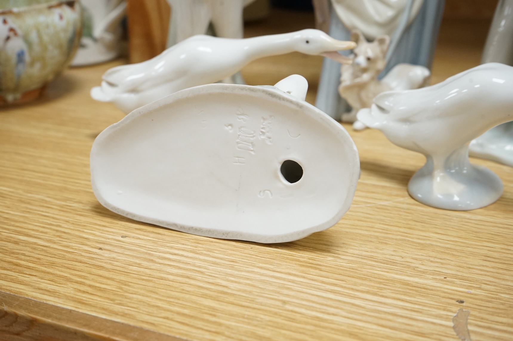 Five Lladro figures and one other, tallest 37cm high